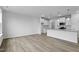 Open concept kitchen with island, granite counters and stainless steel appliances at 1040 Westerland Way # 212, Durham, NC 27703