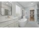 Bathroom with double vanity, freestanding tub and walk-in shower at 1245 Golfers Vw, Pittsboro, NC 27312