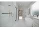 Bathroom with a soaking tub, glass shower, and marble flooring at 1245 Golfers Vw, Pittsboro, NC 27312