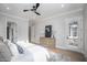 Spacious bedroom with wood floors, large windows and backyard access at 1245 Golfers Vw, Pittsboro, NC 27312