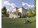 Two-story home with front porch and lush green lawn at 1245 Golfers Vw, Pittsboro, NC 27312
