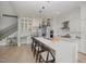 Modern kitchen with island, stainless steel appliances, and pendant lights at 1245 Golfers Vw, Pittsboro, NC 27312