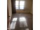 Spacious carpeted bedroom with two windows at 1714 Fox Hollow Dr, Raleigh, NC 27610