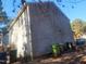 Rear view of home showing gray siding and yard at 1714 Fox Hollow Dr, Raleigh, NC 27610