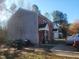 Exterior view of two story home with red door at 1714 Fox Hollow Dr, Raleigh, NC 27610