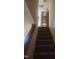 Carpeted stairs leading to upper level at 1714 Fox Hollow Dr, Raleigh, NC 27610