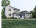 Two-story house with gray and white siding, deck, and landscaping at 183 Lookout Rdg, Pittsboro, NC 27312
