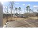 Large backyard with a wooden deck overlooking the expansive yard at 2908 Frances Marie Ln, Raleigh, NC 27603