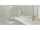 Modern bathroom featuring a glass shower with a built-in bench and a sleek white vanity with gold hardware at 2908 Frances Marie Ln, Raleigh, NC 27603