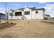 Beautiful home exterior with a large backyard and a covered deck at 2908 Frances Marie Ln, Raleigh, NC 27603
