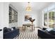Bright home office featuring a built-in bookcase, wainscoting, and lots of natural light at 2908 Frances Marie Ln, Raleigh, NC 27603