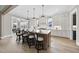 Bright and open kitchen with large island, stainless steel appliances, and plenty of counter space for cooking and entertaining at 2908 Frances Marie Ln, Raleigh, NC 27603