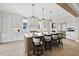 Beautiful kitchen featuring a large center island with seating, sleek stainless steel appliances, and ample counter space at 2908 Frances Marie Ln, Raleigh, NC 27603