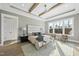 Stunning main bedroom boasts a tray ceiling with exposed wood beams and many windows at 2908 Frances Marie Ln, Raleigh, NC 27603
