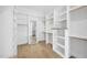 Spacious walk-in closet with custom shelving and ample storage space at 2908 Frances Marie Ln, Raleigh, NC 27603