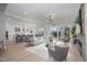 Open concept living space with kitchen, island, and fireplace at 45 Quail Pt, Pittsboro, NC 27312