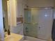 Clean bathroom with shower/tub combo and updated vanity at 513 Port Dr, Henderson, NC 27537