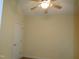 Bright bedroom with ceiling fan and ample closet space at 513 Port Dr, Henderson, NC 27537