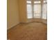 Spacious bedroom with bay windows and neutral carpet at 513 Port Dr, Henderson, NC 27537