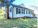 Single Gathering home with a well-maintained lawn and new roof at 826 Carter Ave, Durham, NC 27703
