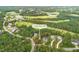 Aerial view of a vacant lot near a golf course at 9 High Ridge Ln, Pittsboro, NC 27312