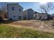 New home construction backyards featuring new sod and newly built houses at 110-A S Hyde Park Ave, Durham, NC 27703