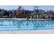 A stunning community pool featuring lap lanes, a waterslide, and a play area, perfect for Gathering fun and relaxation at 12 Cabin Crk, Pittsboro, NC 27312