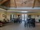 Community meeting area featuring multiple tables, seating, and decor at 12 Cabin Crk, Pittsboro, NC 27312