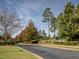Street view of homes in Chapel Ridge, showing fall foliage at 12 Cabin Crk, Pittsboro, NC 27312