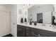 Modern bathroom with double vanity, bright lighting, and updated fixtures at 236 George Pine Way, Knightdale, NC 27545