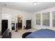 Bright bedroom with a view into a bathroom at 236 George Pine Way, Knightdale, NC 27545