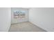 Bright bedroom showcasing a double window allowing natural light to stream in at 43 Honeydew Way, Clayton, NC 27520