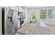 Modern kitchen boasts stainless steel appliances, granite countertops, and ample cabinet space at 43 Honeydew Way, Clayton, NC 27520