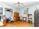 Bedroom featuring hardwood floors, vintage furniture, and light blue walls at 507 W C St, Erwin, NC 28339