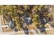 Aerial view of home showcasing its wooded lot, driveway and proximity to neighbors at 5705 Katha Dr, Holly Springs, NC 27540