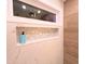 Stylish shower with mosaic tile niche and sleek fixtures at 5705 Katha Dr, Holly Springs, NC 27540