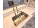 Stainless steel sink with modern faucet and white countertop at 5705 Katha Dr, Holly Springs, NC 27540