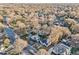 Wide shot aerial view of a home and surrounding neighborhood at 808 W Willowbrook Dr, Burlington, NC 27215