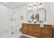 Modern bathroom with double vanity and walk-in shower at 808 W Willowbrook Dr, Burlington, NC 27215