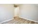This bedroom features neutral walls, sleek baseboards and modern hardwood floors at 309 Monterey Ct, Benson, NC 27504