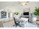 Bright home office with vaulted ceilings, ceiling fans, sleek flooring and a modern desk and decor at 309 Monterey Ct, Benson, NC 27504