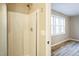 Bathroom featuring a shower and a window at 309 Monterey Ct, Benson, NC 27504
