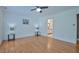Spacious bedroom with hardwood floors, modern fixtures, and an ensuite bathroom at 340 Andrews Store Rd, Pittsboro, NC 27312