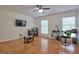 Bedroom featuring wood floors and natural light at 340 Andrews Store Rd, Pittsboro, NC 27312