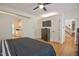 Bedroom with ceiling fan, closet and easy access to other rooms at 340 Andrews Store Rd, Pittsboro, NC 27312