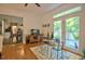 Charming dining area with access to the kitchen and french doors to the outside at 340 Andrews Store Rd, Pittsboro, NC 27312