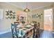 Cozy dining area with black tile floors, stylish decor, and an inviting ambiance at 340 Andrews Store Rd, Pittsboro, NC 27312