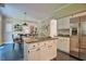 Open concept kitchen with granite counters, stainless steel appliances, and breakfast area at 340 Andrews Store Rd, Pittsboro, NC 27312