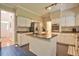 Spacious kitchen featuring an island with granite countertops and stainless steel appliances at 340 Andrews Store Rd, Pittsboro, NC 27312