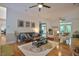 Open concept living room with hardwood floors, neutral decor, and plenty of space for seating at 340 Andrews Store Rd, Pittsboro, NC 27312